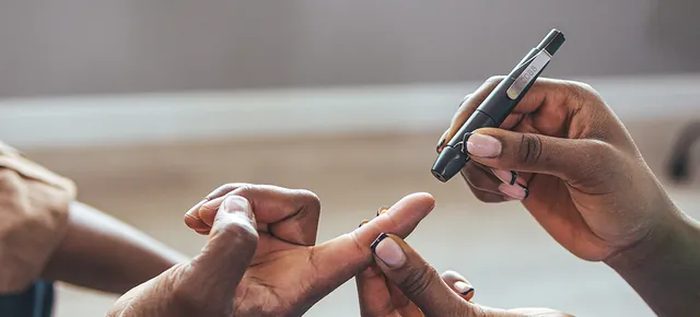 A finger-prick blood sugar test