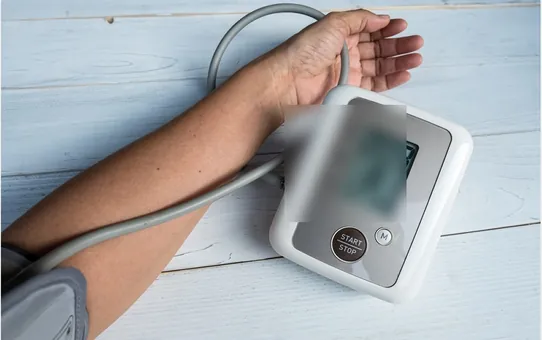 A home blood pressure monitor on an arm